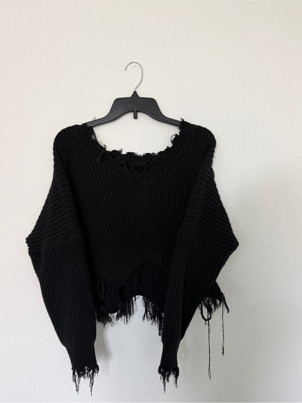 black v-neck sharkbite distressed chunky knit sweater